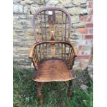 19thC high back ash and elm Windsor chair with crinoline stretcher.