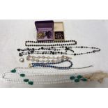 A quantity of vintage costume jewellery including ring marked .925, brooches, 1920's glass beads
