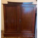 Mahogany Edwardian inlaid two door cupboard.