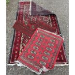 Three vintage rugs.