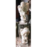 Pair reconstituted stone garden cherub figures. 59cms h.