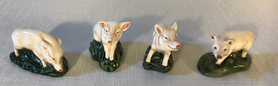 Four Royal Doulton pigs, HN2652, HN2653, HN2648, HN2649