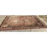 Persian patterned rug, 277 cms x 196 cms