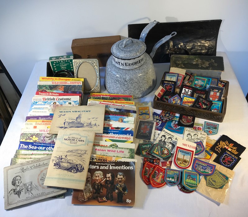 Boxed lot to contain enamel Quaker oats cooker, Brooke Bond tea cards, carved wood box etc.