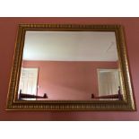 Good quality bevel edged gilt framed wall mirror. 93 x 118 cms.