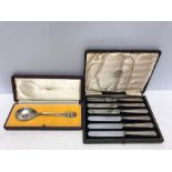 Tiffany silver spoon in original fitted presentation case. London 1938. Together with boxed set of