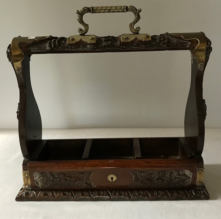 Good quality carved oak and brass mounted tantalus lacking bottles. - Image 2 of 2
