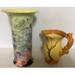 Burleigh ware jug with squirrel handle 18 cm h. and a Myott & Co. vase 29 cm h.