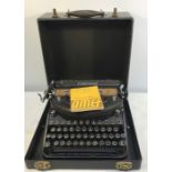 A 1920's Underwood noiseless portable typewriter in black rexine case.