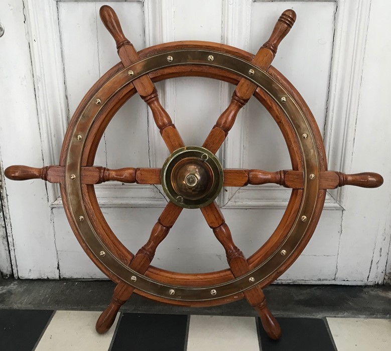 Lawrence Simpson mahogany and brass ships wheel. 77cms w.