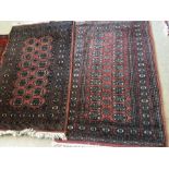 Two hand knotted rugs, 150 x 93cms.