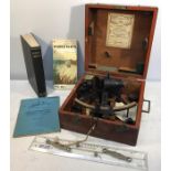 Kelvin and Hughes sextant No. 38296 with books including Nories tables and parallel rule etc.