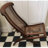 Steamer chair, late 19thC/Early 20thC with caned seat and back panel, folding action.