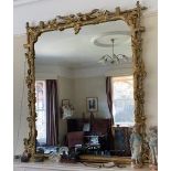 A 19thC large wooden overmantel mirror 152 cm high approx 145 wide overpainted but in good used
