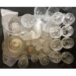 A large quantity of cut glasses, decanters, vases etc.