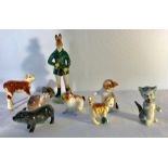 Eight various mainly Royal Doulton animals including kittens and pig.