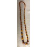 Vintage butterscotch amber and glass bead necklace, 41cms l.