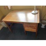 Mid century teak kneehole desk.