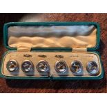 Set of six glass buttos with horse head decoration in original leather case