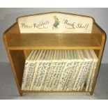 Peter rabbit's bookshelf with 23 books. 29cms l, 26cms w, 12cms d