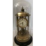 Glass dome cased brass anniversary mantle clock approx 43.5cms h