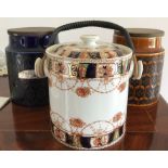 Two Hornsea pottery storage jars and a biscuit barrel.