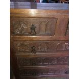 An unusual carved chest of drawers reputedly to be from Liberty.