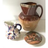 Three 19thC ceramics including small jug, pot lid and silver topped harvest jug.