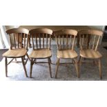 Four pine chairs.