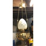 Brass hanging ceiling lamp with acid etched pear drop glass shade.