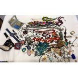 A large quantity of vintage costume jewellery including Swatch watches, necklaces, earrings etc.