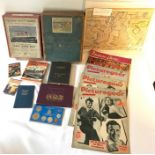 A mixed lot including British Rail Rule book. G.W.R jigsaw, R.M.S Queen Mary jigsaw. British and