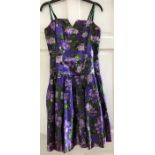 Purple floral 1950's dress labelled John Selby London 38, waist measurement 41cms laid flat.