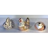Three Royal Crown Derby paperweights all with stopper to include rabbit, hen and grouse.