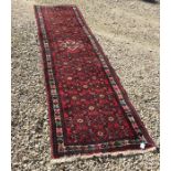 Persian pattern hall runner rug. 290cms x 73cms.