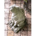 Reconstituted stone rabbit garden ornament. 48cms h.