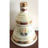 A sealed ceramic Bell Decanter, Alexander Fleming 1881-1955 2003 700ml
