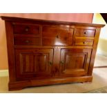 Cherry wood sideboard. 129 w 39 d x 91cms h.