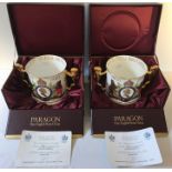 Two large Paragon china limited edition two-handled Loving Cups with gilt lion handles,