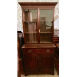 A 19thC bookcase with glazed top.