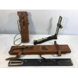 WWII issue military measuring tool, timbers 1940 and a wood cased slide rule E.\r. Watts & Sons