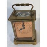 Brass cased carriage clock with an unusual copper face. Heal the sick., Raise the dead, Cut out