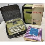 Playcraft Petite portable typewriter with original box.