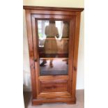 Cherry wood glazed single door cabinet. 159 h x 75 w x 35cms d