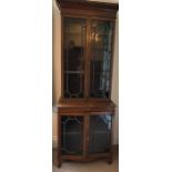 Two height mahogany bookcase with inlay. 185cms h, 68cms w, 42cms d. damage to glass, loose beading.