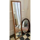 Two wooden framed mirrors. Largest 127 x 30cms