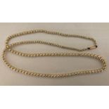 Graduated pearl necklace with 9ct clasp. 60cms l.