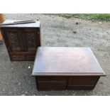 Small drawer unit and cabinet with carved doors opening to reveal drawers.