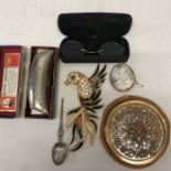 Miscellany including Le Rage powder compact, silver spoon, pince nez shell cameo brooch, Hohner