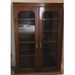 Two door mahogany glazed bookcase top. (missing cornice top right)